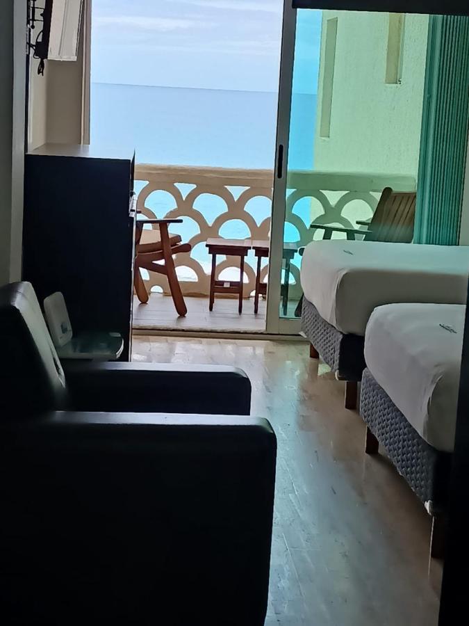 Capitan Suites Sea View Канкун Екстериор снимка